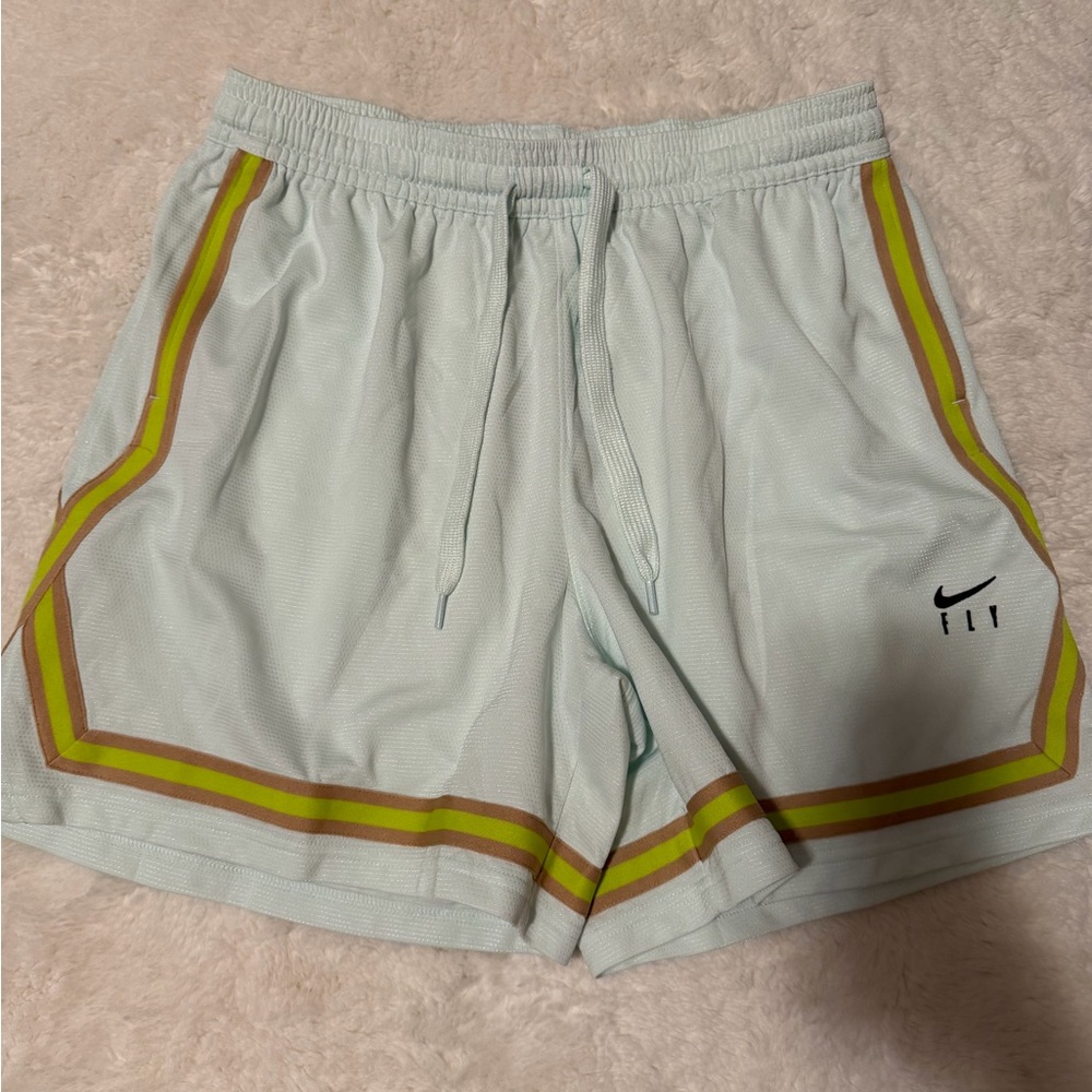 Nike Women's Mint Green Athletic Shorts with Striped Accents